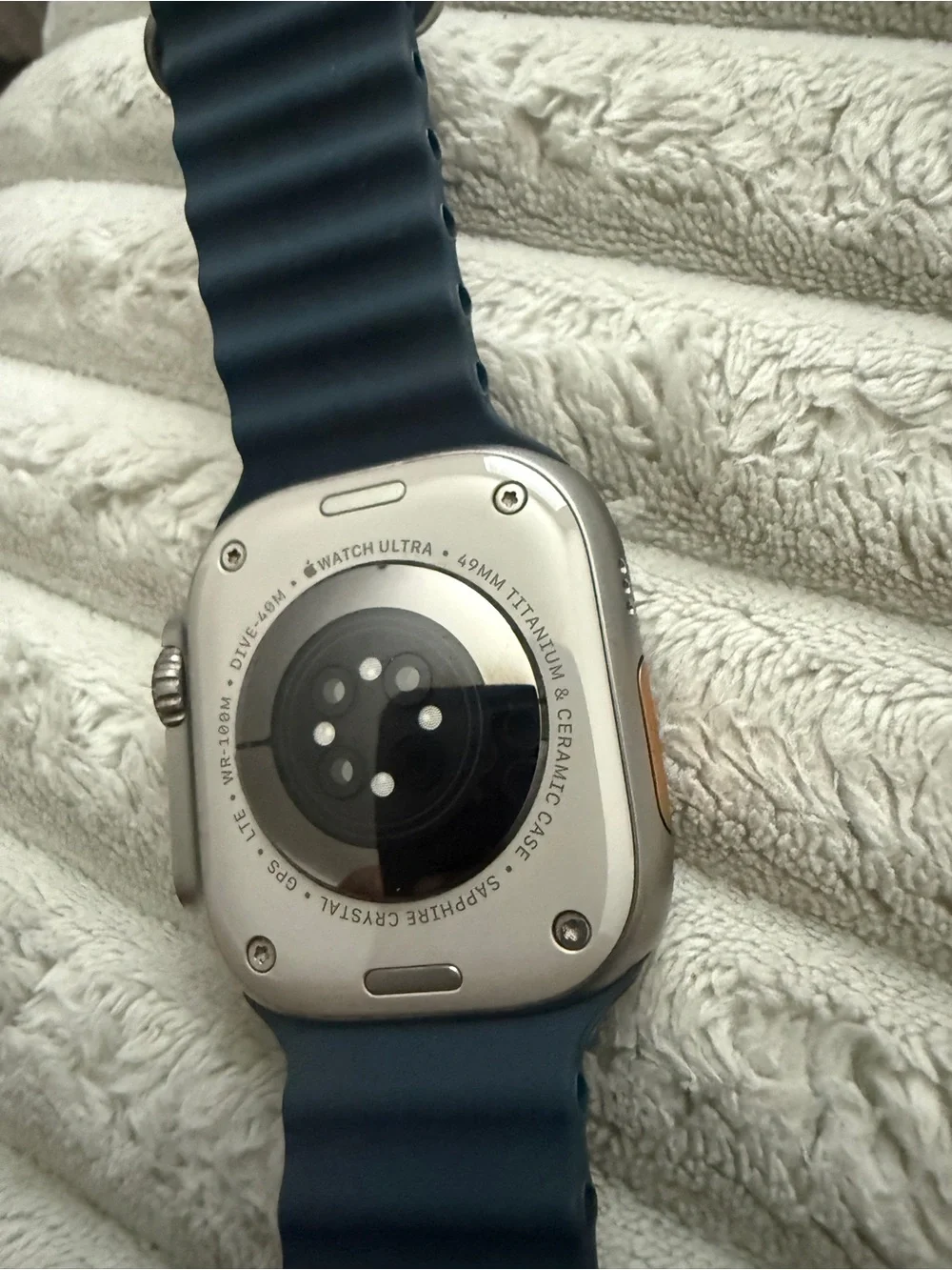 Apple Watch Ultra new - refurbishedwith Navy Silicone Strap and Magnetic Charger
